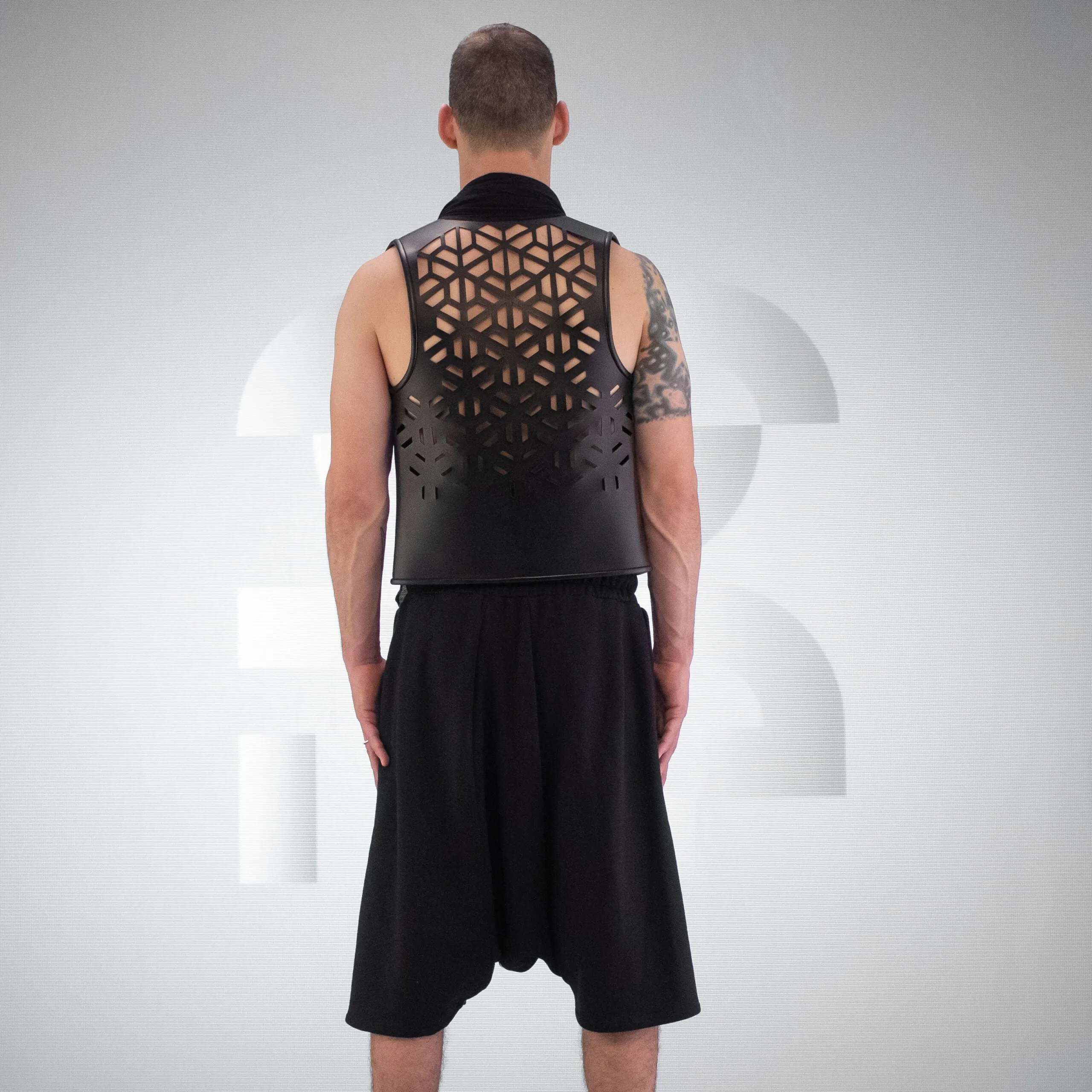Flowing Laser-Cut Faux Leather Vest