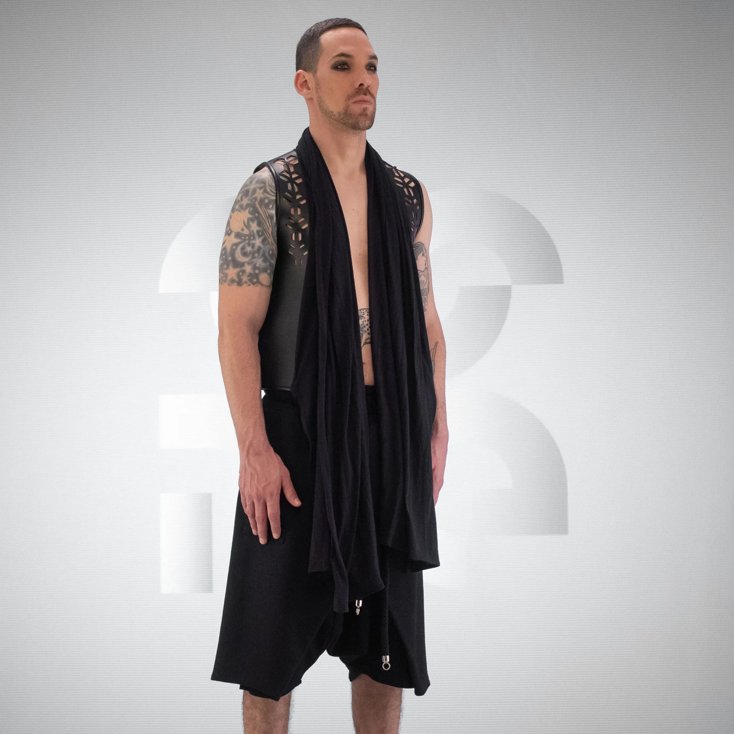 Flowing Laser-Cut Faux Leather Vest
