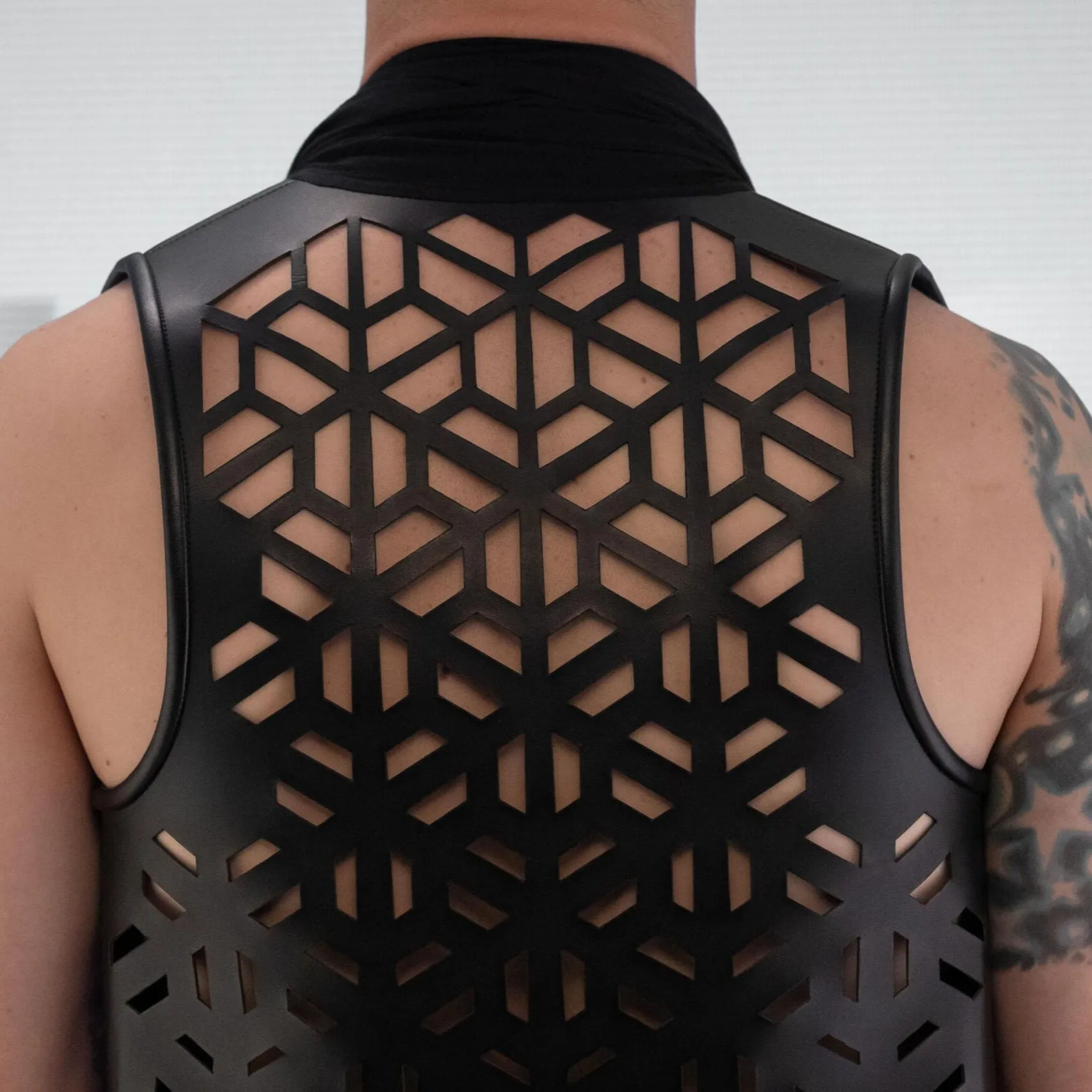 Flowing Laser-Cut Faux Leather Vest